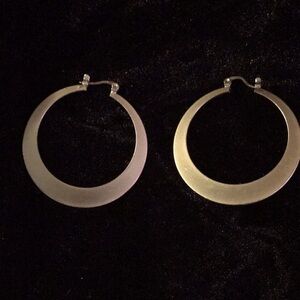 Large gold tone earrings